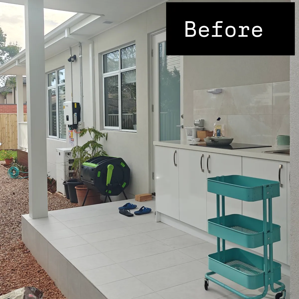 Before: an open back porch with a kitchenette, exposed to the weather